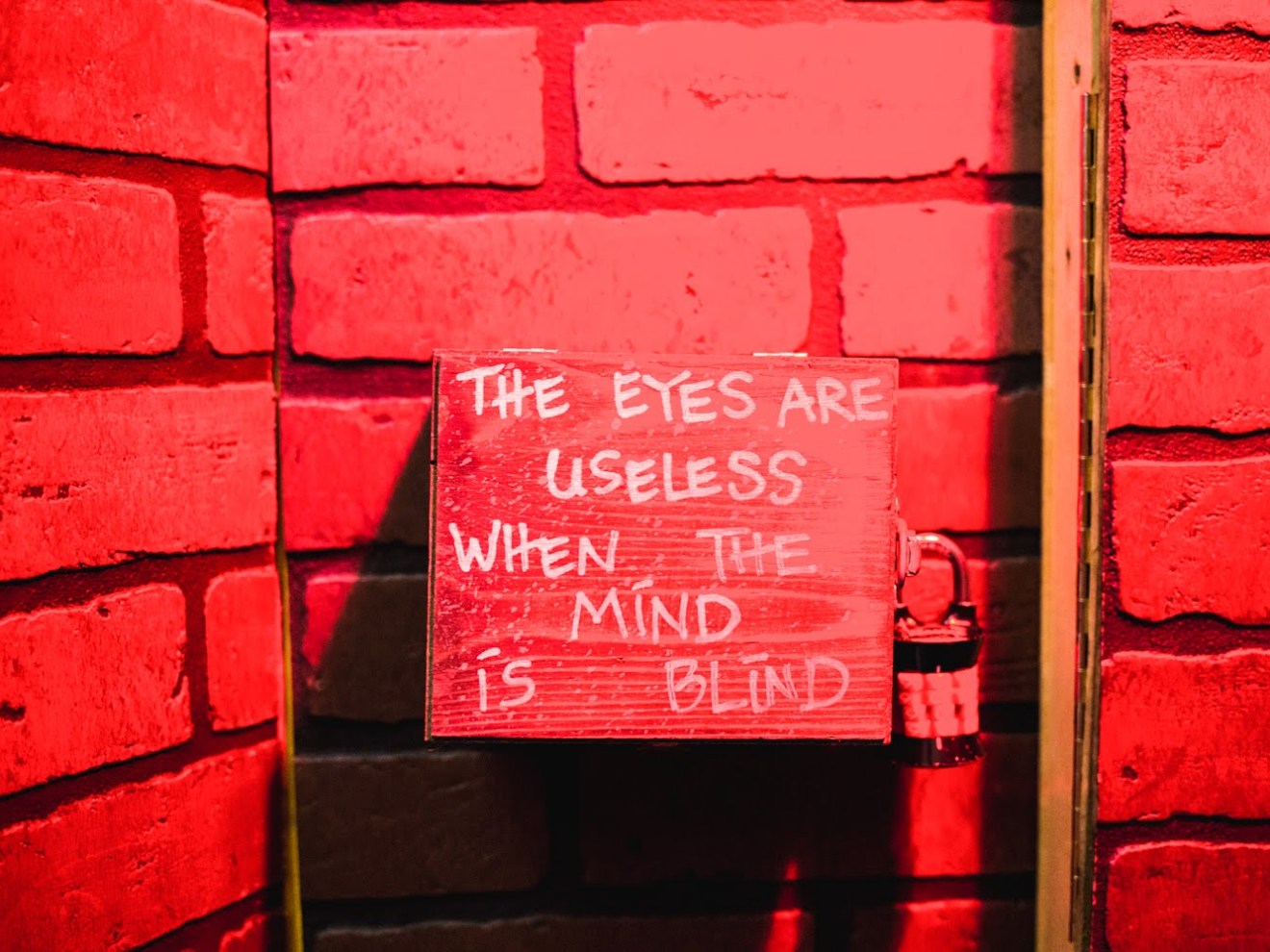 red image with a sign that reads 